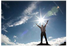 Man with Hands up to the sky in victory